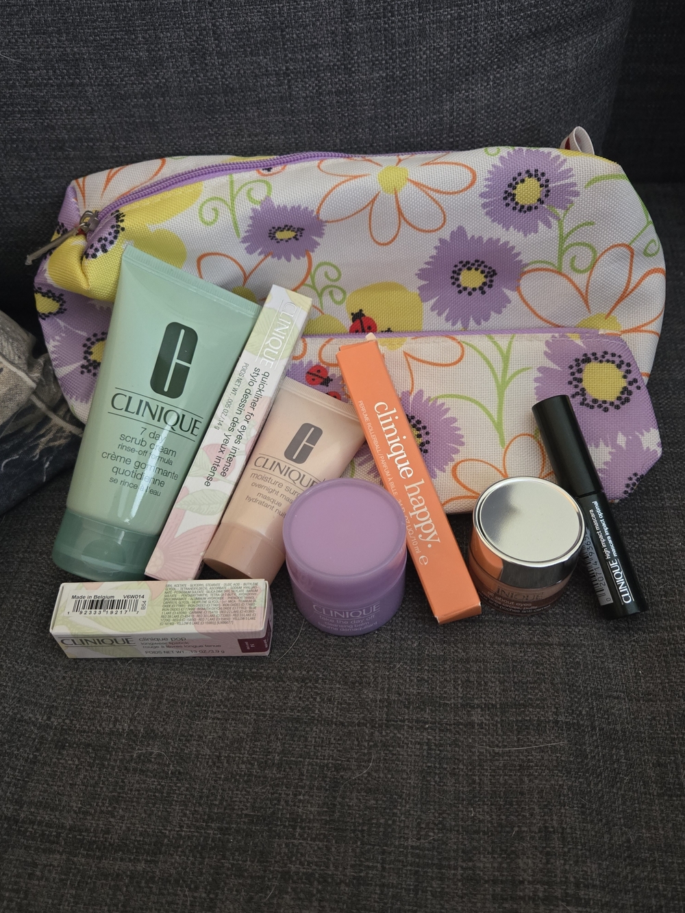 8 Piece Clinique Collection with 2 Purple Floral Pouches, Skincare, Makeup, Etc.